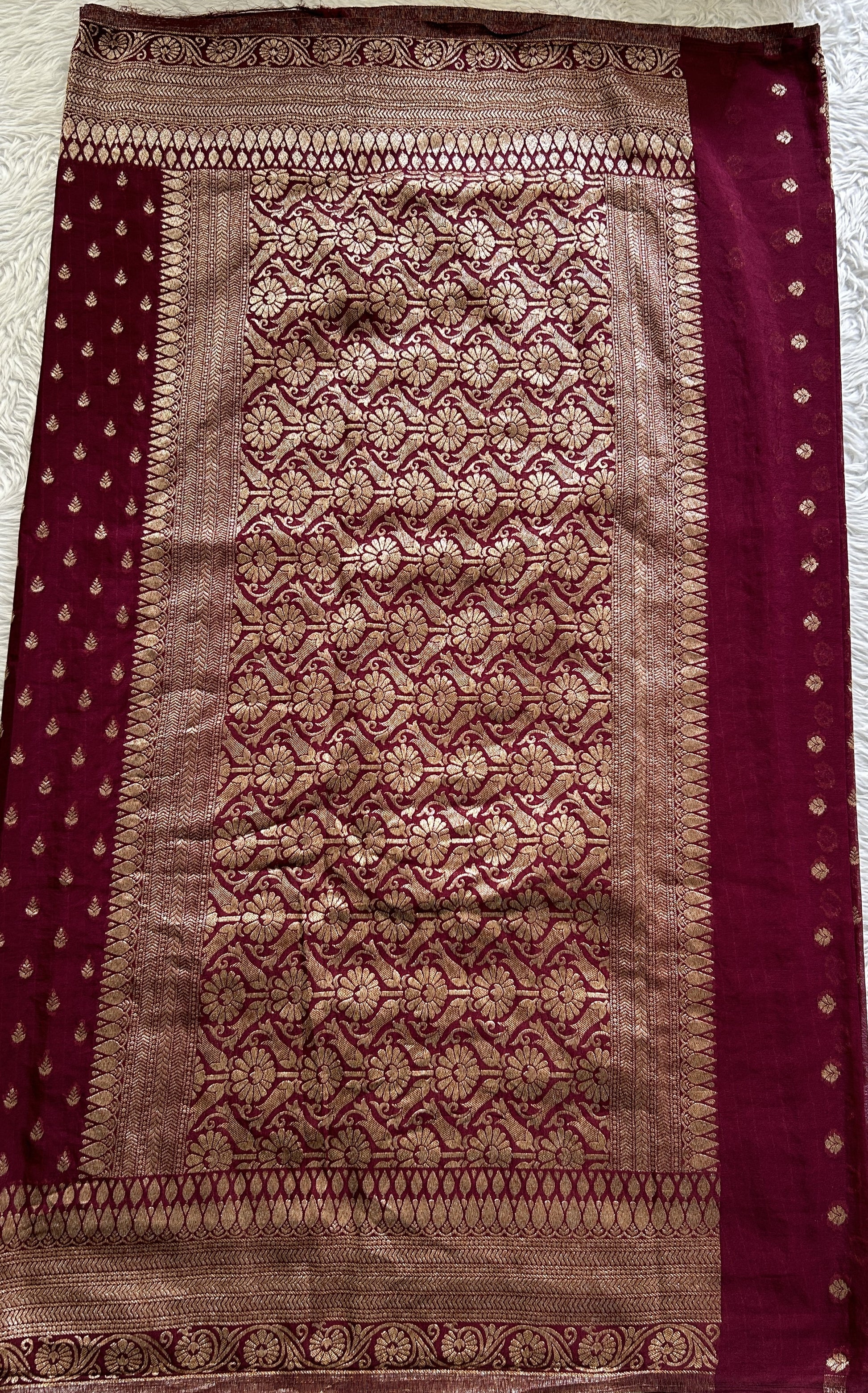 Semi Georgette Saree Magenta Colored Complemented with a Zari Border. - Sampradaya Designer Studio