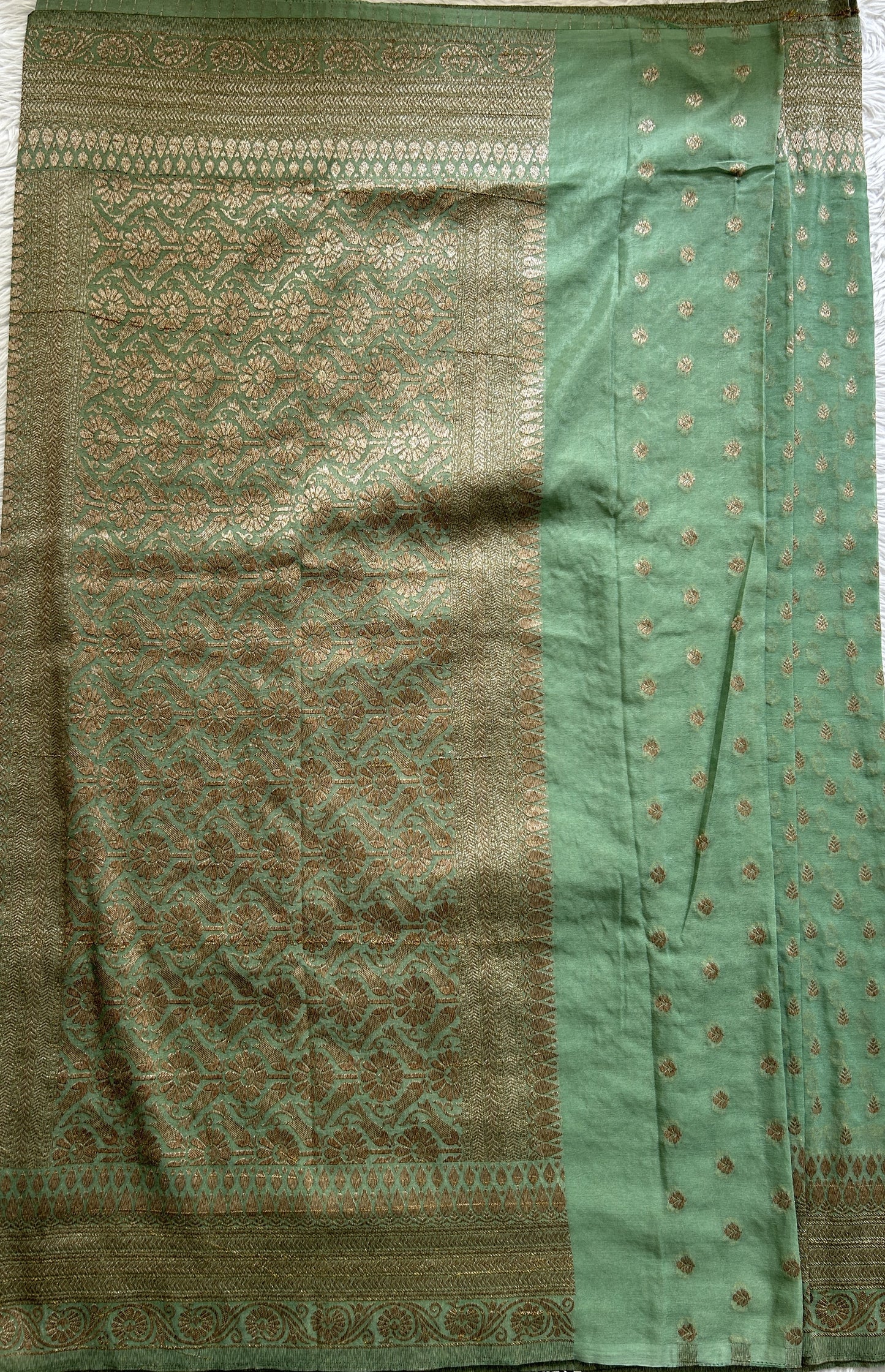 Semi Georgette Saree Sea Green Colored Complemented with a Zari Border. - Sampradaya Designer Studio