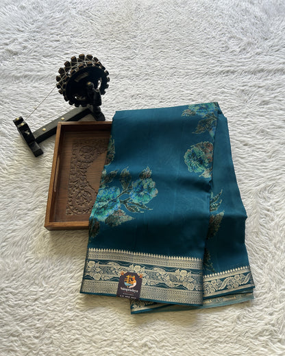 Satin Georgette Saree Peacock Blue Colored Elegantly Paired with a Zari Border. - Sampradaya Designer Studio