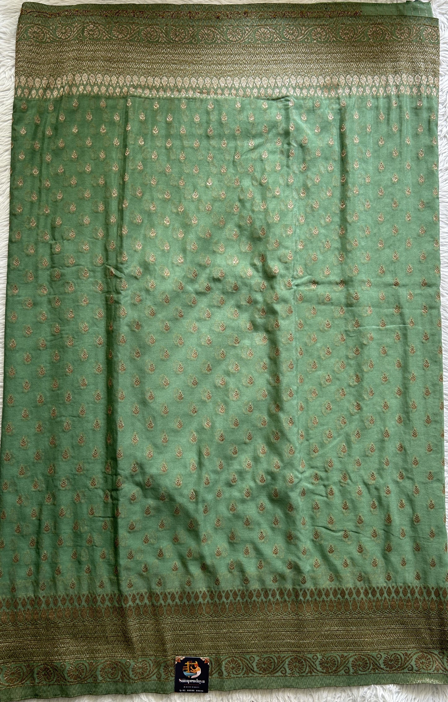 Semi Georgette Saree Sea Green Colored Complemented with a Zari Border. - Sampradaya Designer Studio