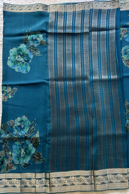 Satin Georgette Saree Peacock Blue Colored Elegantly Paired with a Zari Border. - Sampradaya Designer Studio