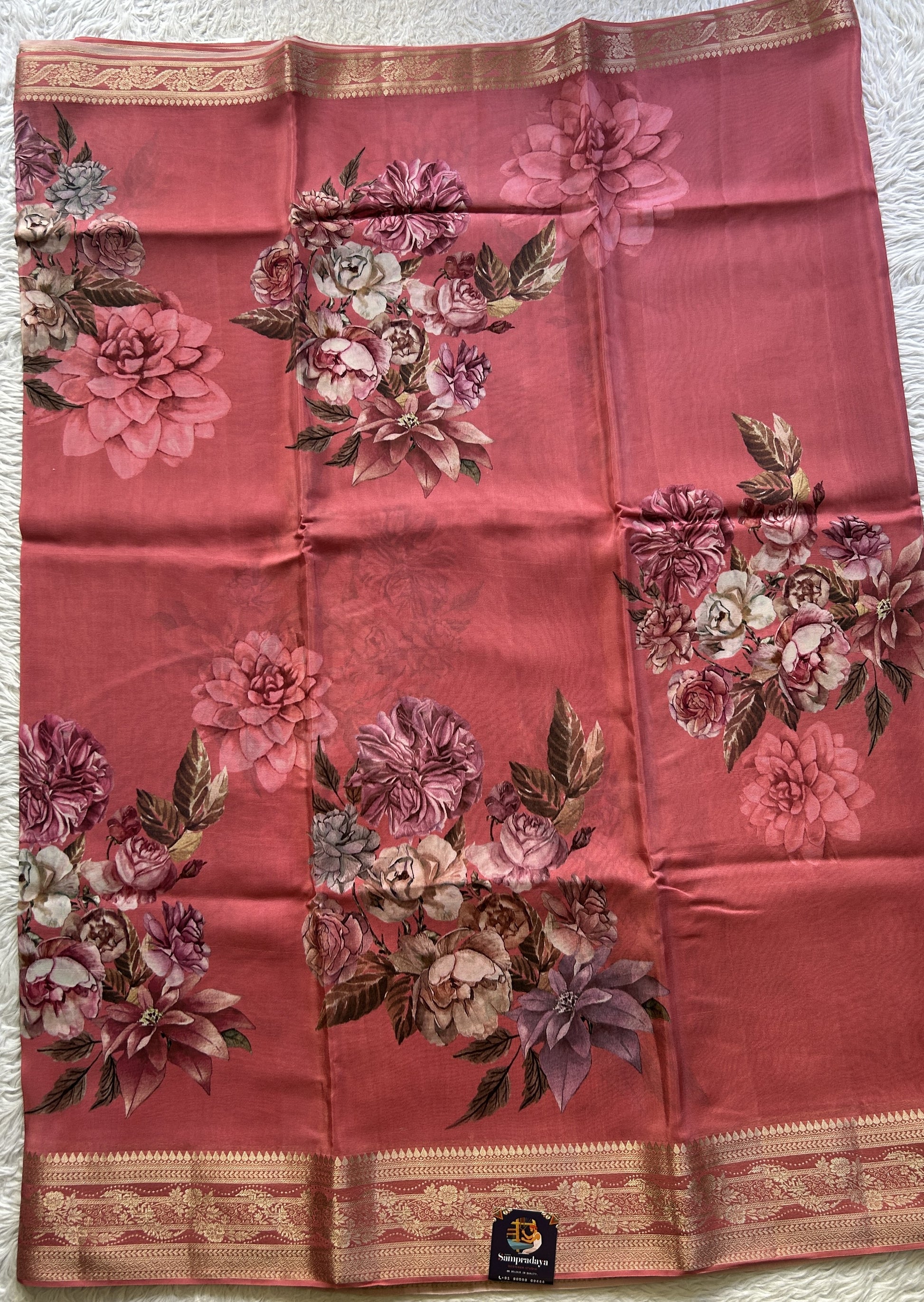 Satin Georgette Saree Peach Colored Elegantly Paired with a Zari Border. - Sampradaya Designer Studio
