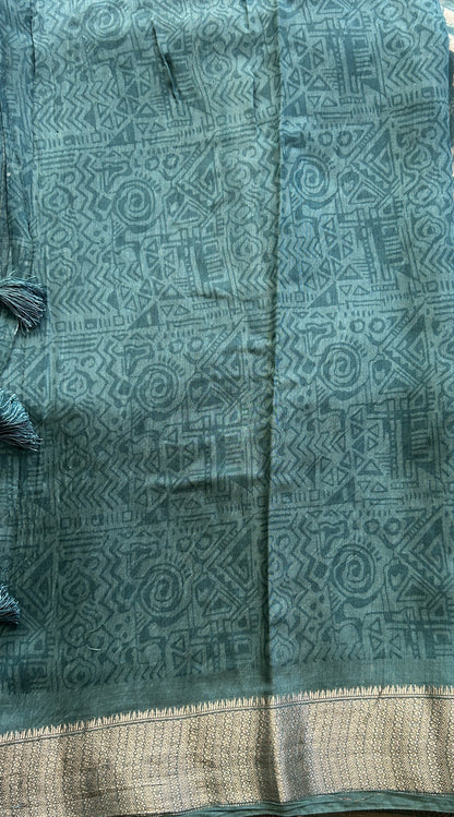 Dola Crepe Saree Ocean Green Colored Elegantly Paired with a Zari Border. - Sampradaya Designer Studio