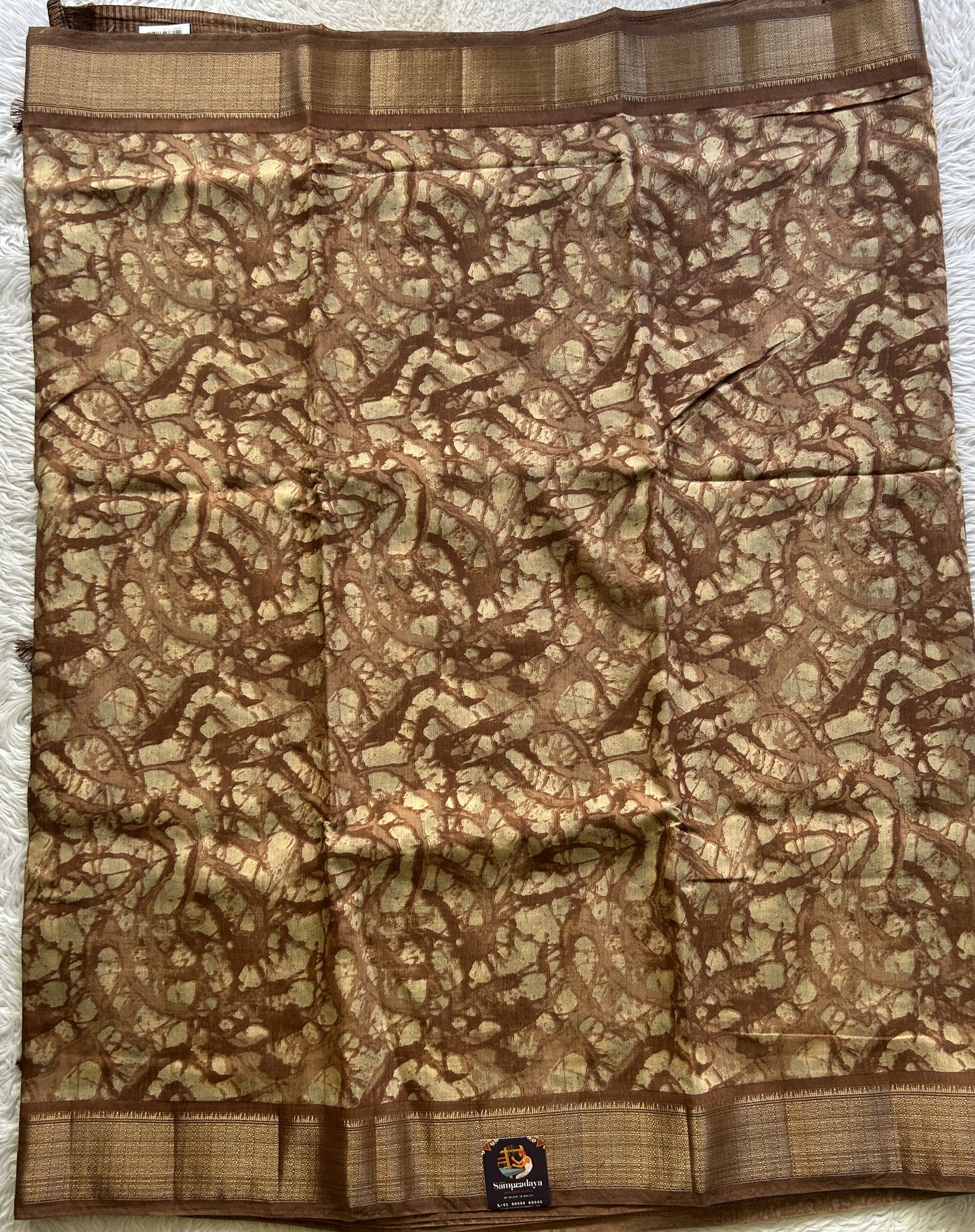 Dola Crepe Saree Russet Colored Elegantly Paired with a Zari Border. - Sampradaya Designer Studio