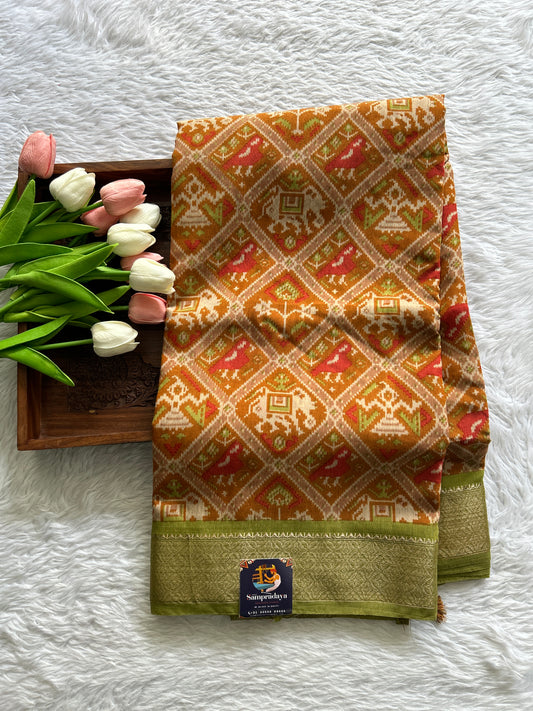 Dola Crepe Saree Orange Colored Complemented with a Zari Border. - Sampradaya Designer Studio