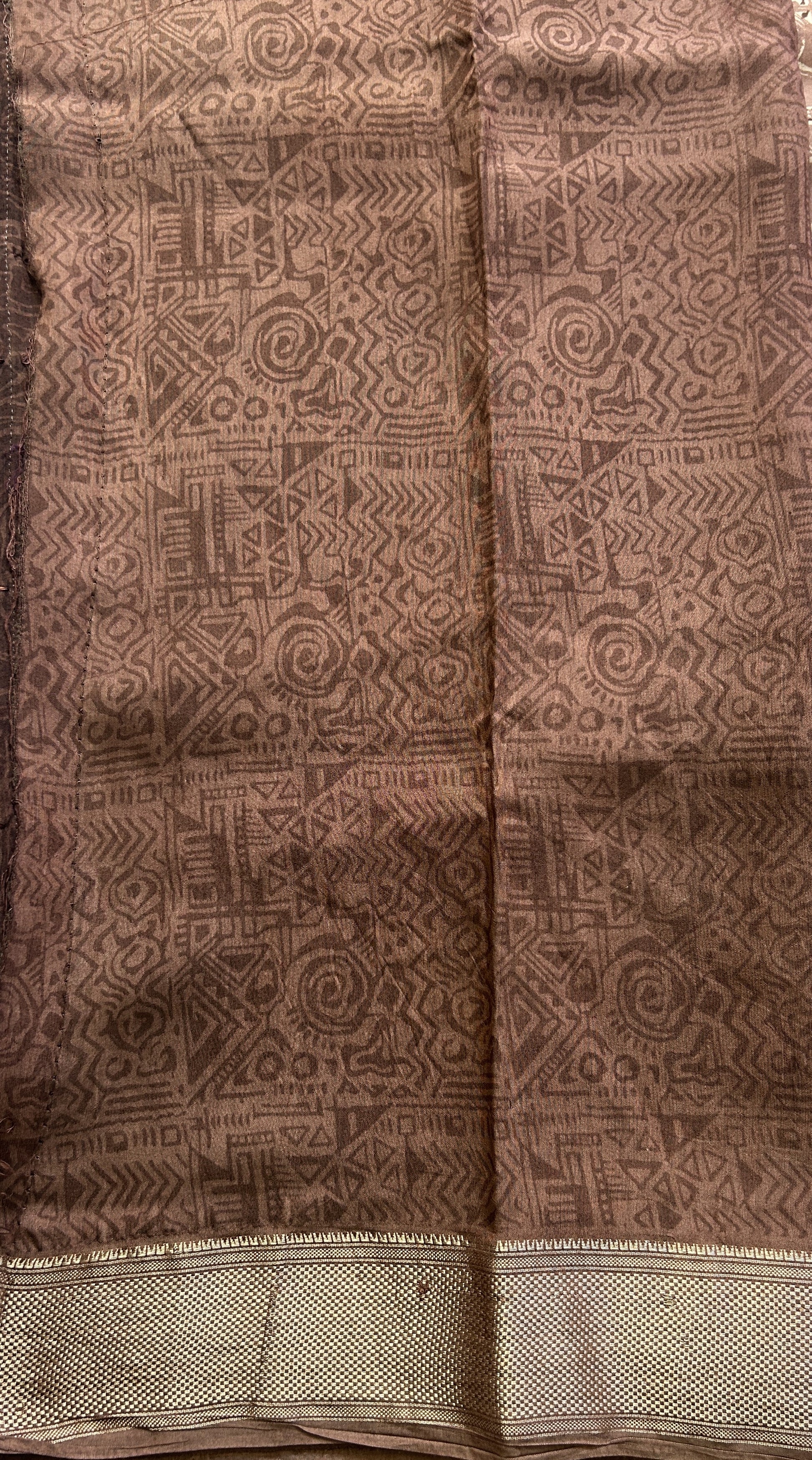 Dola Crepe Saree Light Brown Colored Elegantly Paired with a Zari Border. - Sampradaya Designer Studio