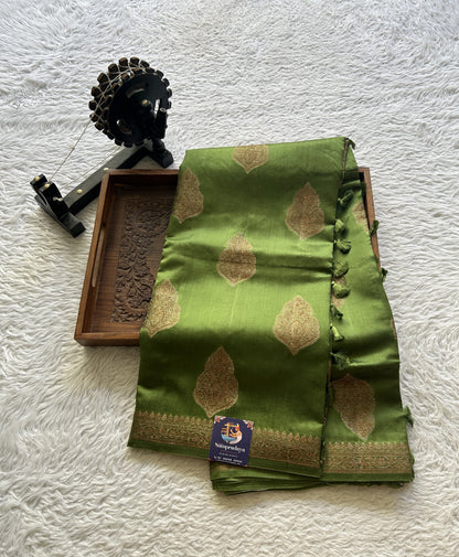 Chiniya Silk Saree Green Colored Elegantly Paired with a Zari Border. - Sampradaya Designer Studio