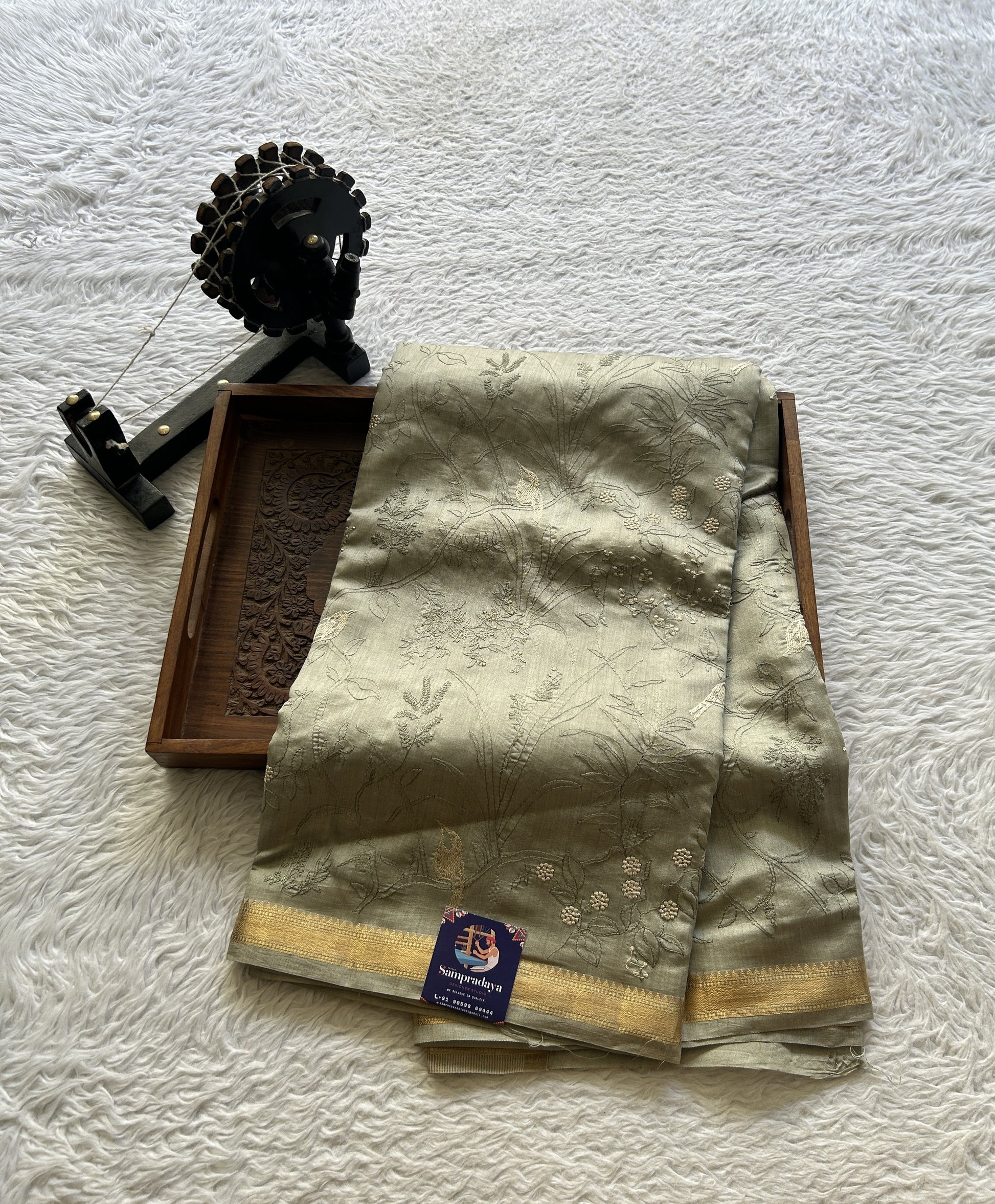 Chiniya Silk Saree Ash Colored Elegantly Paired with a Zari Border. - Sampradaya Designer Studio