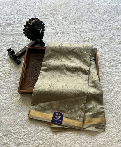 Chiniya Silk Saree Ash Colored Elegantly Paired with a Zari Border. - Sampradaya Designer Studio