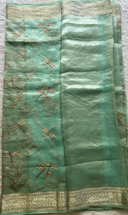 Tissue Organza Designer Saree Aqua Green colored Saree Paired with a Zari border. - Sampradaya Designer Studio