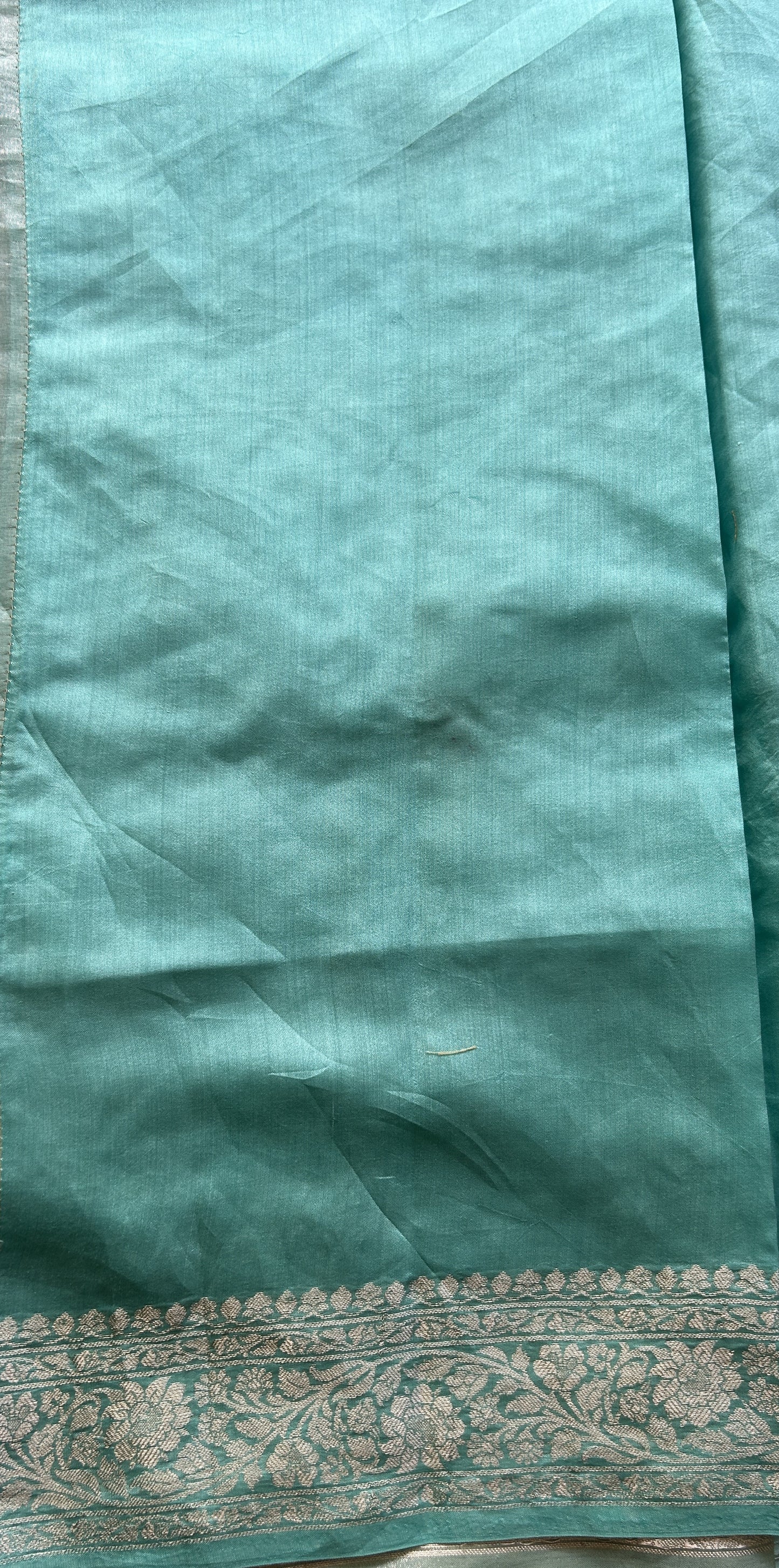Tissue Organza Designer Saree Aqua Green colored Saree Paired with a Zari border. - Sampradaya Designer Studio