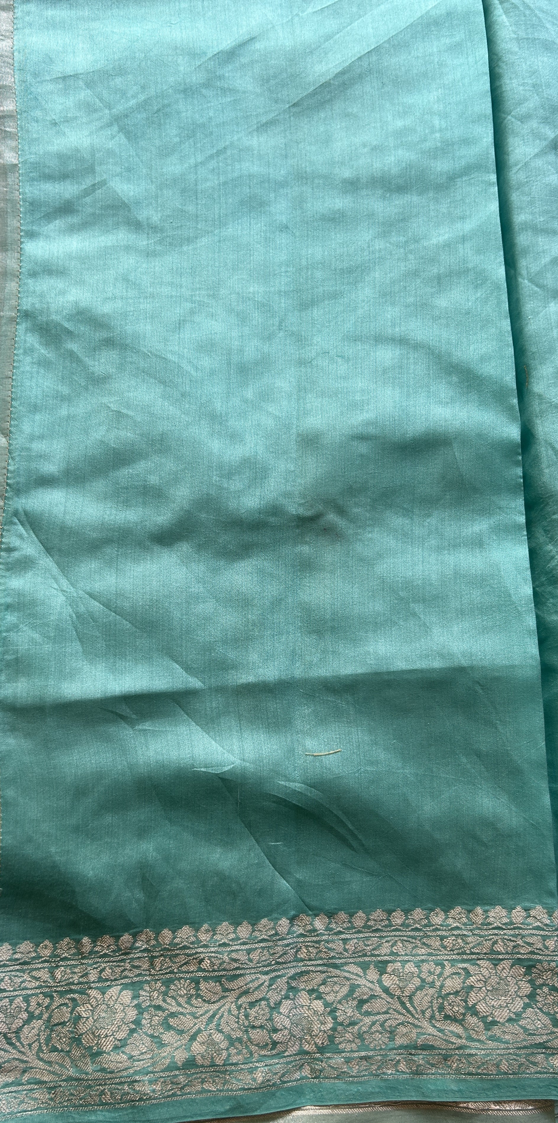 Tissue Organza Designer Saree Aqua Green colored Saree Paired with a Zari border. - Sampradaya Designer Studio