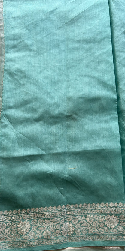Tissue Organza Designer Saree Aqua Green colored Saree Paired with a Zari border. - Sampradaya Designer Studio