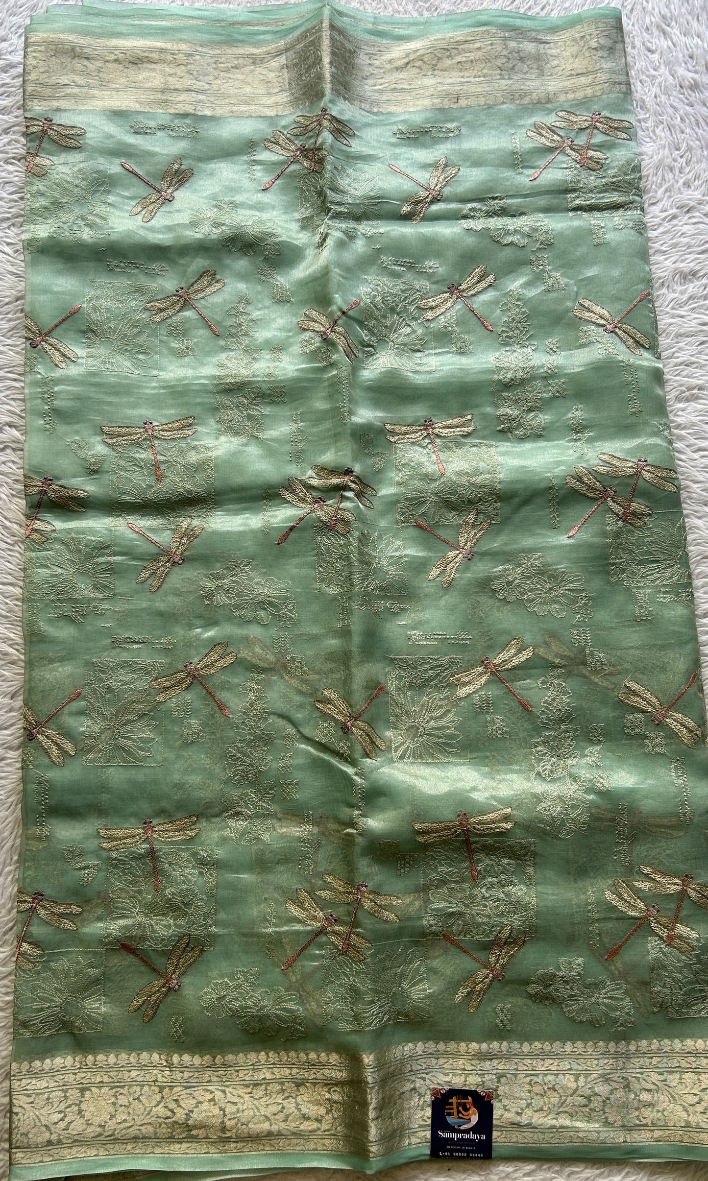 Tissue Organza Designer Saree Aqua Green colored Saree Paired with a Zari border. - Sampradaya Designer Studio