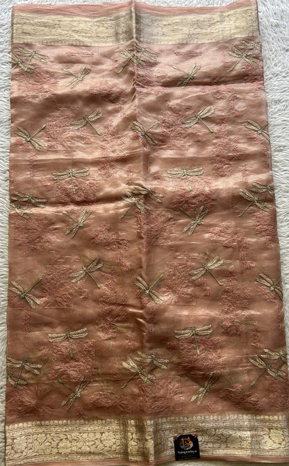 Tissue Organza Designer Saree Light Peach colored Saree Paired with a Zari border. - Sampradaya Designer Studio