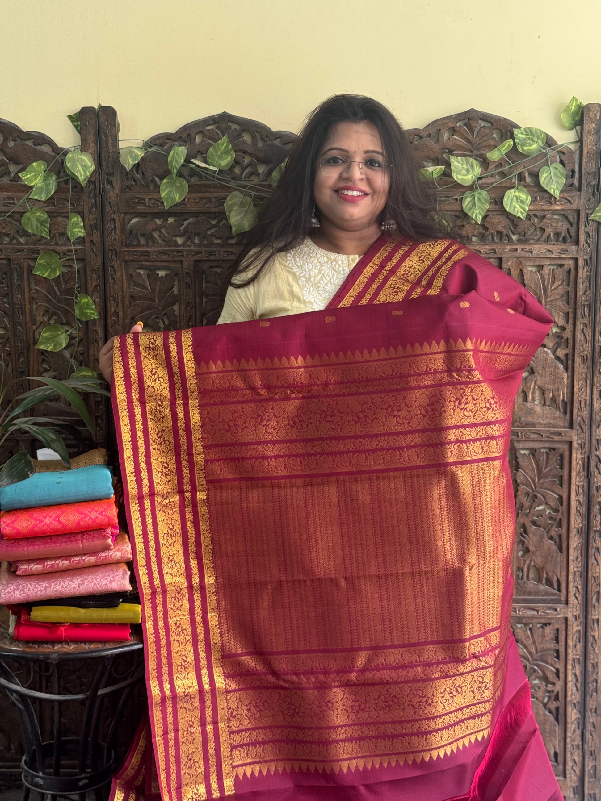 Pure Kanjivaram Silk Saree Maroon Complemented with a Gold Zari Border. - Sampradaya Designer Studio
