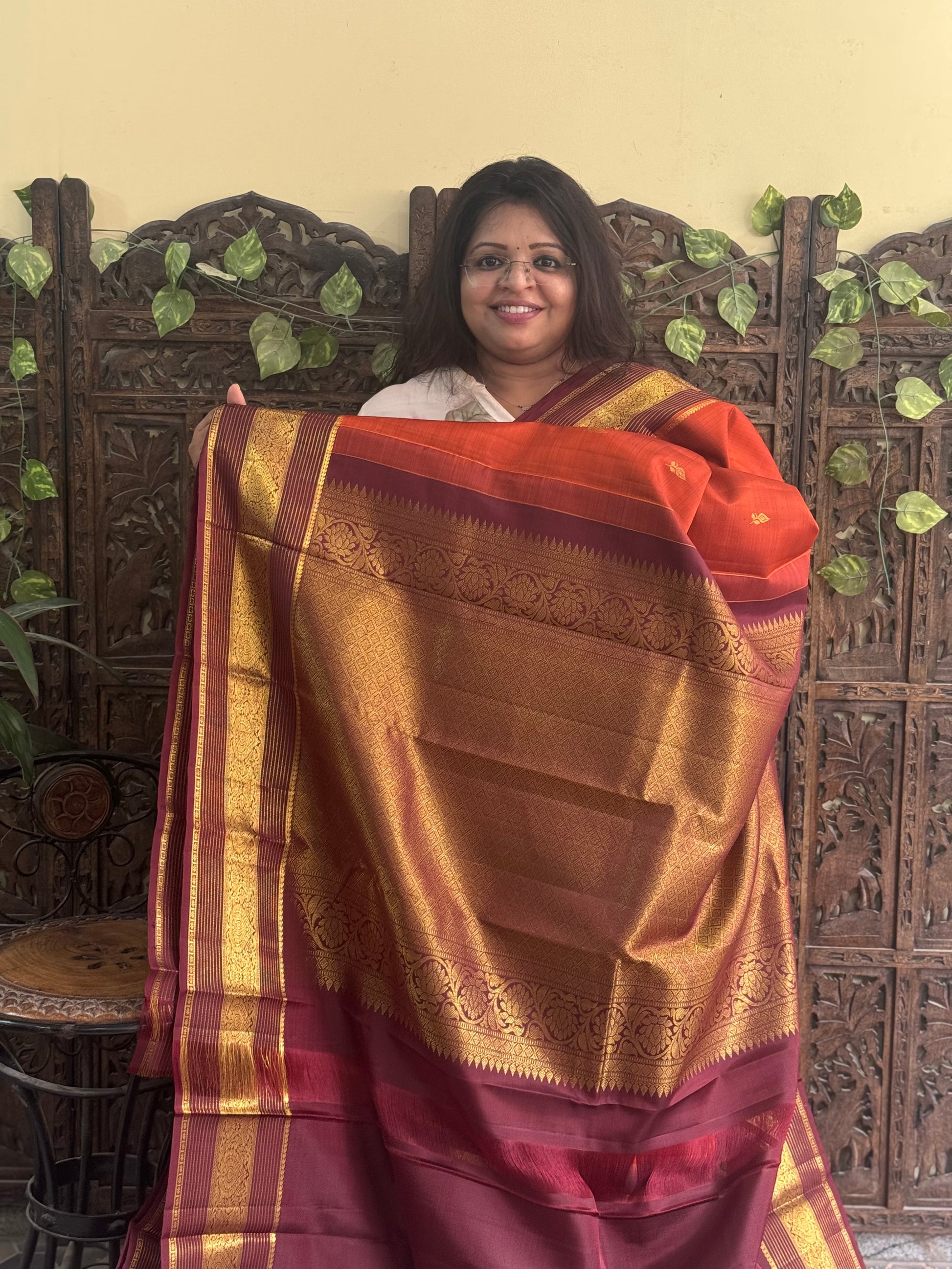 Pure Kanjivaram Silk Saree Rusted Orange Colored Complemented with Brown color Border with a Gold Zari Weaving. - Sampradaya Designer Studio