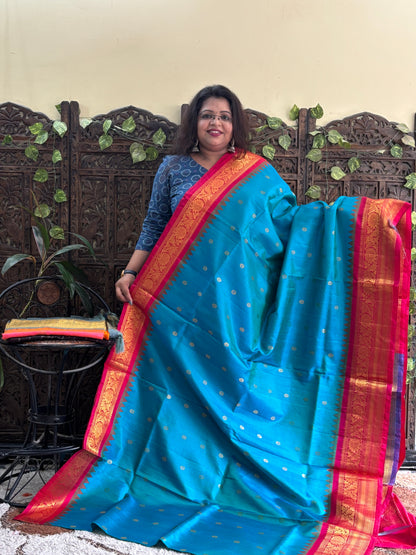 Gadwal Silk Saree Dark Aqua Blue Colored Complemented With a Zari Border. - Sampradaya Designer Studio