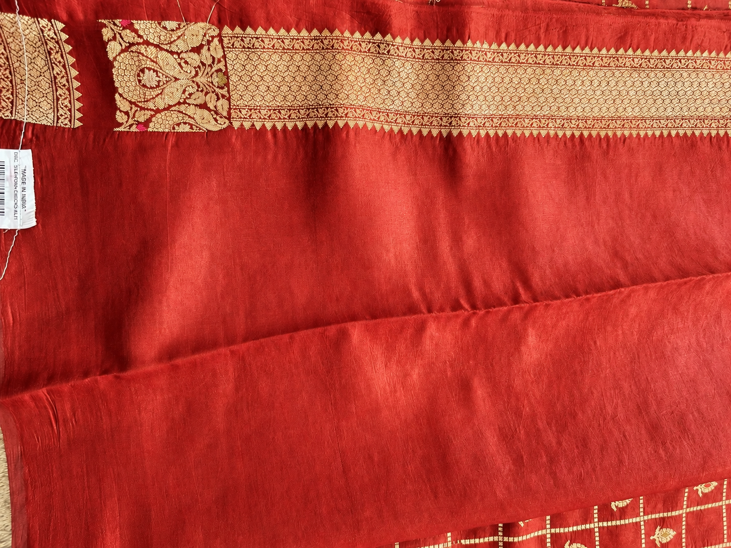 Pure Chiniya Silk Saree Red Colored Elegantly Paired with a Gold Zari Border.