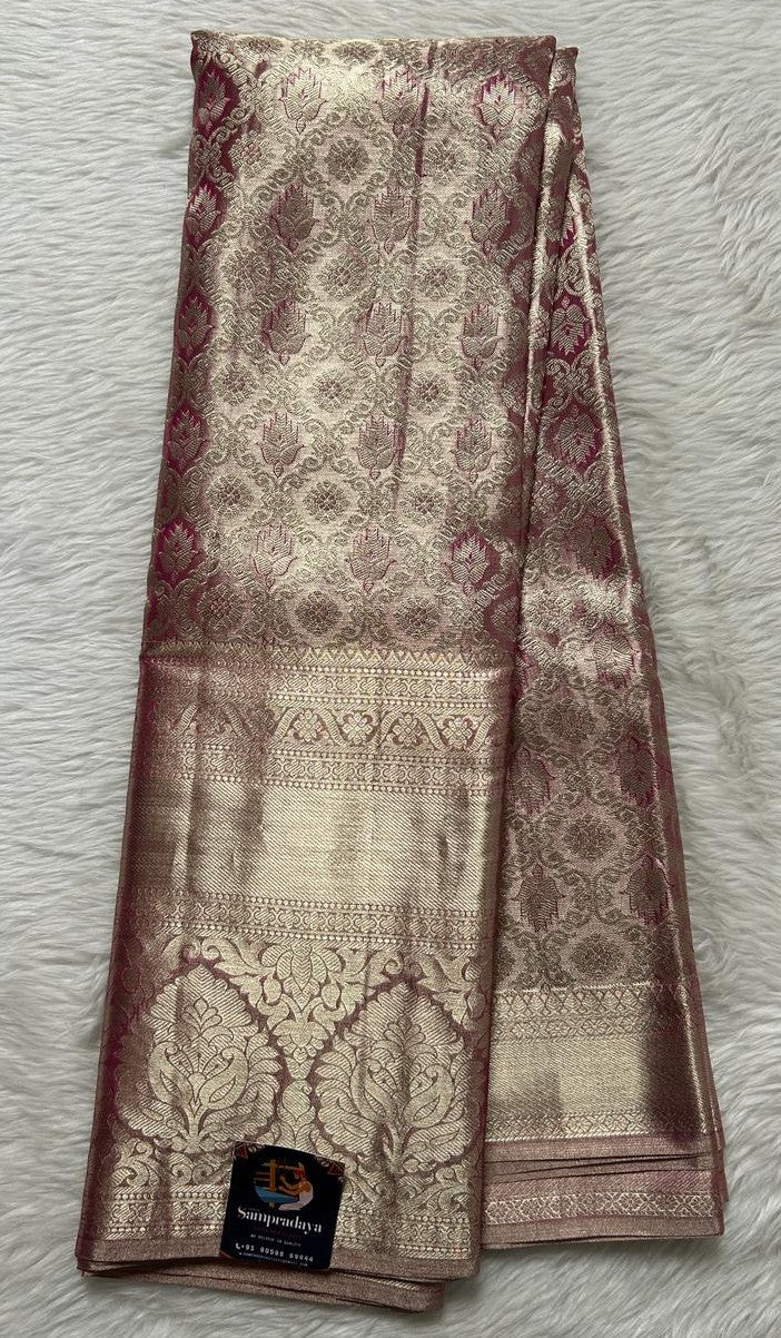 Kanjivaram Bridal Silk Saree Pink colored allover Weaving Saree complemented with a Light Gold Zari Kanchi border. - Sampradaya Designer Studio