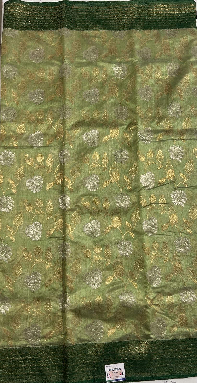 Chanderi Pattu Saree Pastel Green colored saree complemented with a Bottle Green Gold Zari border - Sampradaya Designer Studio