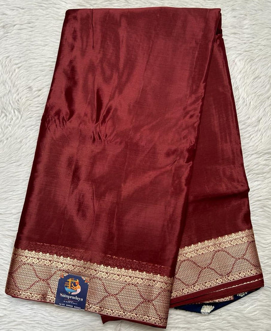 Satin Georgette Saree Brown Colored Complemented with a Zari Border. - Sampradaya Designer Studio