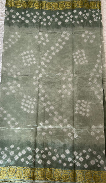 Bandhani Saree Sea Green Colored Complemented with a Zari Border. - Sampradaya Designer Studio