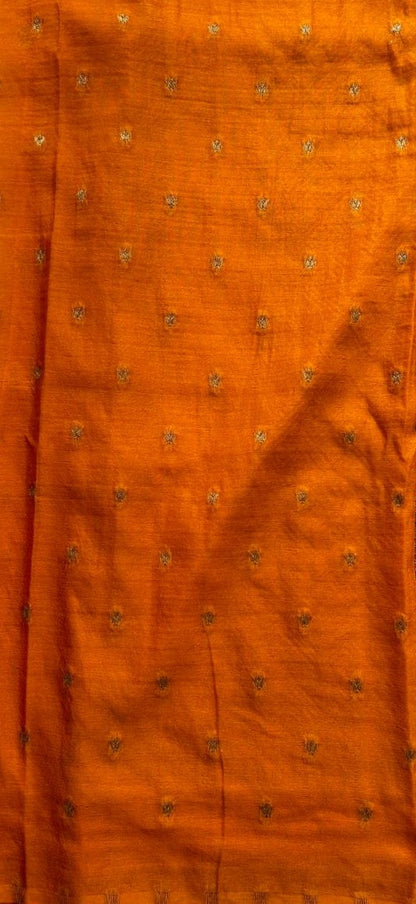Semi Georgette Saree Orange Colored Complemented with a Zari Border. - Sampradaya Designer Studio